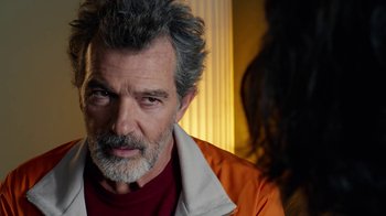 Movie still from “Pain and Glory” (2019), directed by Pedro Almodóvar – A person wearing a jacket; Close Up shot, Over the shoulder angle