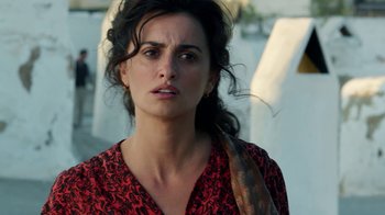 Movie still from “Pain and Glory” (2019), directed by Pedro Almodóvar – A person wearing a red and black shirt; Close Up shot, Over the shoulder angle