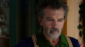 Movie still from “Pain and Glory” (2019), directed by Pedro Almodóvar – A person with a beard; Close Up shot, Over the shoulder angle