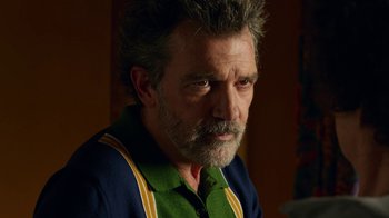 Movie still from “Pain and Glory” (2019), directed by Pedro Almodóvar – A person with a beard; Close Up shot, Over the shoulder angle