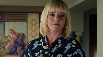 Movie still from “Pain and Glory” (2019), directed by Pedro Almodóvar – A person wearing a floral shirt; Close Up shot, Low angle