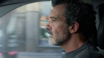 Movie still from “Pain and Glory” (2019), directed by Pedro Almodóvar – A person with a beard; Close Up shot, Over the shoulder angle