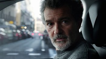 Movie still from “Pain and Glory” (2019), directed by Pedro Almodóvar – A person in a car; Close Up shot, Over the shoulder angle