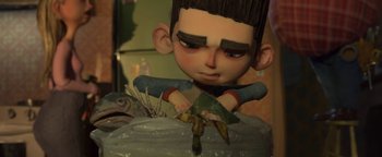 Movie still from “ParaNorman” (2012), directed by Sam Fell – A cartoon boy's face and head; Close Up shot, Low angle