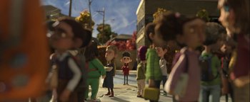Movie still from “ParaNorman” (2012), directed by Sam Fell – A group of people standing around a building; Wide shot, High angle