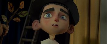 Movie still from “ParaNorman” (2012), directed by Sam Fell – A boy's face with a hat on; Close Up shot, Low angle