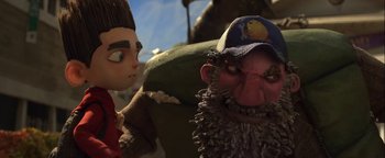 Movie still from “ParaNorman” (2012), directed by Sam Fell – A stuffed animal head and a stuffed animal face; Close Up shot, Over the shoulder angle