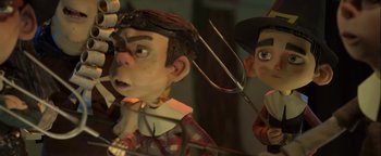 Movie still from “ParaNorman” (2012), directed by Sam Fell – View of a toy of a boy and a girl; Close Up shot, Low angle