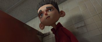 Movie still from “ParaNorman” (2012), directed by Sam Fell – The head of a cartoon character; Close Up shot, Low angle