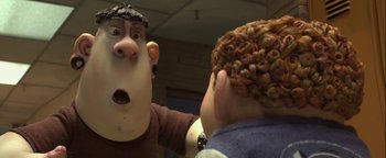 Movie still from “ParaNorman” (2012), directed by Sam Fell – A man and a woman are looking at each other in a mirror; Close Up shot, Over the shoulder angle