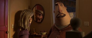 Movie still from “ParaNorman” (2012), directed by Sam Fell – A man and a woman looking at each other in front of a mirror; Close Up shot, Over the shoulder angle