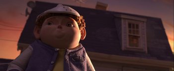 Movie still from “ParaNorman” (2012), directed by Sam Fell – The head of a doll wearing a baseball cap; Close Up shot, Low angle