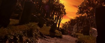 Movie still from “ParaNorman” (2012), directed by Sam Fell – A dirt road that has some trees on the side of the road; Extreme Wide shot, High angle