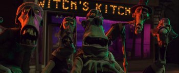 Movie still from “ParaNorman” (2012), directed by Sam Fell – A couple of puppets that are next to each other in a room; Medium shot, Low angle