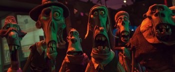 Movie still from “ParaNorman” (2012), directed by Sam Fell – A group of people that are standing in a room; Close Up shot, Low angle