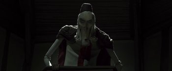 Movie still from “ParaNorman” (2012), directed by Sam Fell – An evil looking statue of a man with a long beard; Close Up shot, Low angle