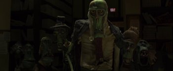 Movie still from “ParaNorman” (2012), directed by Sam Fell – A couple of people that are standing up in the dark; Close Up shot, Low angle