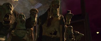 Movie still from “ParaNorman” (2012), directed by Sam Fell – A group of people that are standing in the dark; Medium shot, Low angle