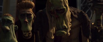 Movie still from “ParaNorman” (2012), directed by Sam Fell – View of some strange looking statues; Close Up shot, Low angle