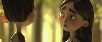 Movie still from “ParaNorman” (2012), directed by Sam Fell – Two animated characters looking at each other in a forest; Close Up shot, Over the shoulder angle