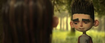 Movie still from “ParaNorman” (2012), directed by Sam Fell – A person's face in a forest; Close Up shot, Over the shoulder angle