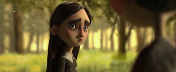 Movie still from “ParaNorman” (2012), directed by Sam Fell – A girl is looking at the camera in a forest; Close Up shot, Over the shoulder angle