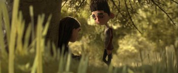 Movie still from “ParaNorman” (2012), directed by Sam Fell – A couple of people standing next to each other in the woods; Medium shot, Over the shoulder angle