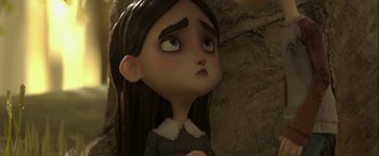 Movie still from “ParaNorman” (2012), directed by Sam Fell – A girl's face in a cave; Close Up shot, Low angle