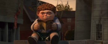 Movie still from “ParaNorman” (2012), directed by Sam Fell – An animated character is reading a book outside; Medium shot, High angle