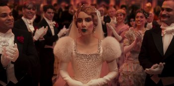 Movie still from “Paradise Hills” (2019), directed by Alice Waddington – A woman dressed as a bride in front of a group of people; Close Up shot, Over the shoulder angle
