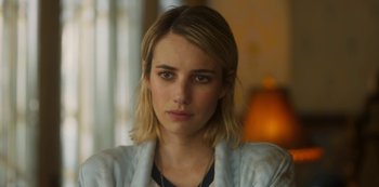 Movie still from “Paradise Hills” (2019), directed by Alice Waddington – A person wearing a white shirt; Close Up shot, Over the shoulder angle