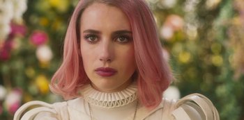 Movie still from “Paradise Hills” (2019), directed by Alice Waddington – A person with pink hair; Close Up shot, Over the shoulder angle