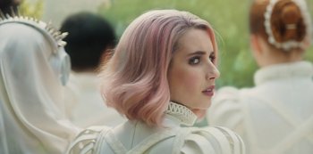 Movie still from “Paradise Hills” (2019), directed by Alice Waddington – A person with pink hair; Close Up shot, Over the shoulder angle