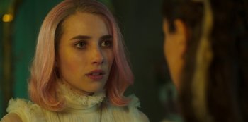 Movie still from “Paradise Hills” (2019), directed by Alice Waddington – A woman with pink hair is looking at another woman; Close Up shot, Over the shoulder angle