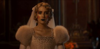 Movie still from “Paradise Hills” (2019), directed by Alice Waddington – A woman in a wedding dress with a veil; Close Up shot, Over the shoulder angle