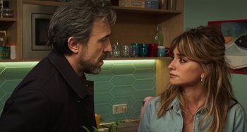 Movie still from “Parallel Mothers” (2021), directed by Pedro Almodóvar – A man and a woman in a kitchen talking to each other; Close Up shot, Over the shoulder angle