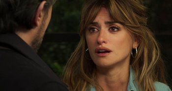 Movie still from “Parallel Mothers” (2021), directed by Pedro Almodóvar – A person looking at a person; Close Up shot, Over the shoulder angle