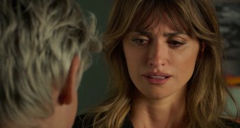 Movie still from “Parallel Mothers” (2021), directed by Pedro Almodóvar – A person talking to another person; Close Up shot, Over the shoulder angle