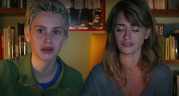 Movie still from “Parallel Mothers” (2021), directed by Pedro Almodóvar – A woman sitting next to a young boy with her eyes closed; Close Up shot, Over the shoulder angle