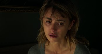 Movie still from “Parallel Mothers” (2021), directed by Pedro Almodóvar – A person with a crying face; Close Up shot, Over the shoulder angle