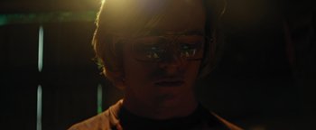 Movie still from “My Friend Dahmer” (2017), directed by Marc Meyers – A man with glasses is looking at the camera; Close Up shot, Low angle