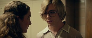 Movie still from “My Friend Dahmer” (2017), directed by Marc Meyers – A man and a woman wearing glasses looking at each other; Close Up shot, Over the shoulder angle
