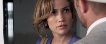 Movie still from “Parker” (2013), directed by Taylor Hackford – A woman's face with brown hair; Close Up shot, Over the shoulder angle