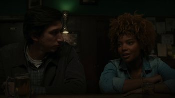 Movie still from “Paterson” (2016), directed by Jim Jarmusch – A man and a woman sitting at a table in front of each other; Close Up shot, Over the shoulder angle