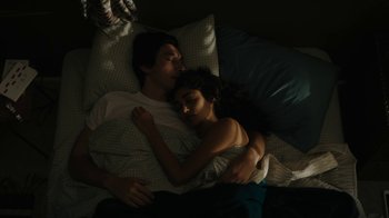 Movie still from “Paterson” (2016), directed by Jim Jarmusch – A man and a woman sleeping in a bed together; Medium shot, Overhead angle