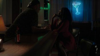 Movie still from “Paterson” (2016), directed by Jim Jarmusch – A man and a woman sitting at a bar; Medium shot, Over the shoulder angle