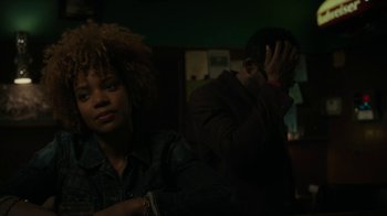 Movie still from “Paterson” (2016), directed by Jim Jarmusch – A man and a woman sitting next to each other in a room; Close Up shot, Over the shoulder angle