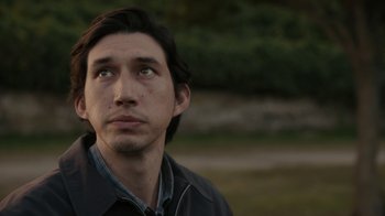 Movie still from “Paterson” (2016), directed by Jim Jarmusch – A person looking up at the sky; Close Up shot, Low angle