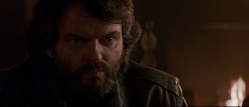 Movie still from “Patriot Games” (1992), directed by Phillip Noyce – A person with a beard; Close Up shot, Low angle