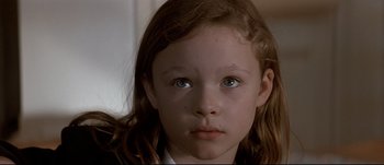 Movie still from “Patriot Games” (1992), directed by Phillip Noyce – A young girl's face with blue eyes; Close Up shot, High angle